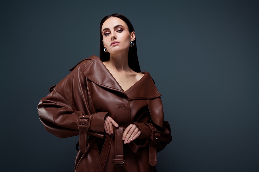 fashionable,confident,beautiful,woman,wearing,trendy,burgundy,leather,raincoat,isolated